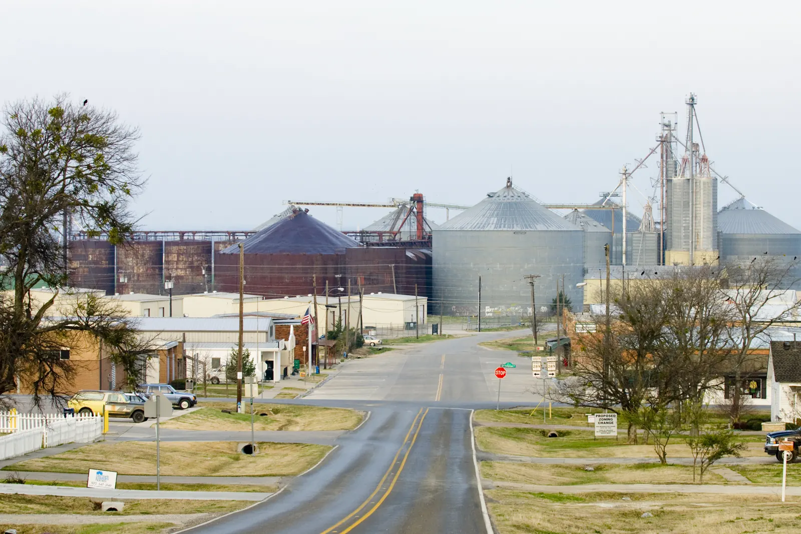 Grain elevators along a street in Prosper, Texas